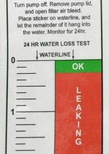 A 24-hour water loss test chart showing water level and leak detection zones.